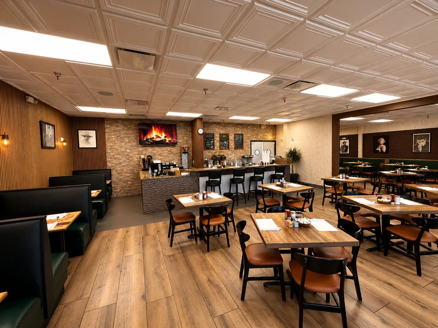 Booths and Hollywood portraits at Starz Restaurant